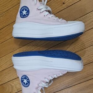Converse Women's Pink High-Tops with Blue Accents
